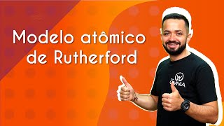 Professor ao lado do texto"Modelo atômico de Rutherford" em fundo laranja.