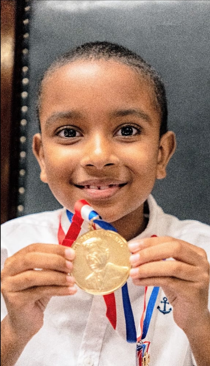 Alvinho e medalha