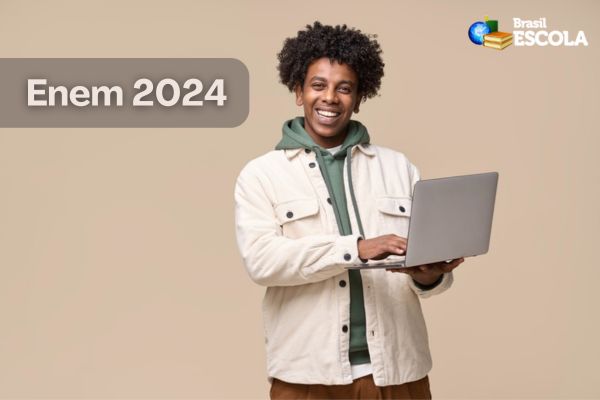 Fundo beje, estudante negro sorrindo com computador, texto Enem 2024.